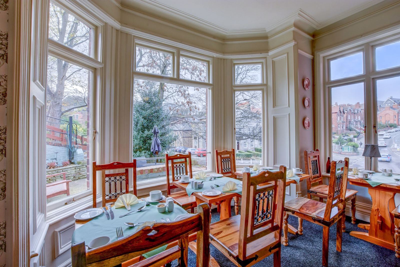 The breakfast room at The Grove, looking out over Pannett Park